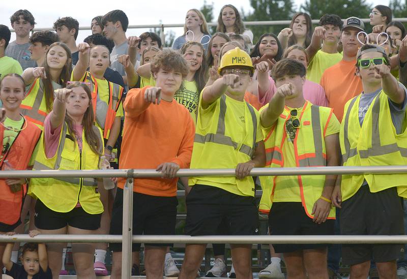 Marquette Crusader fans show support during the home opener Friday against Aurora Christian.