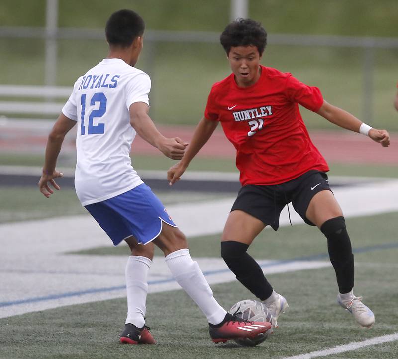 Huntley's Aktai Mametjanov tries to take the ball from Larkin's Alexander Hernandez during a nonconference soccer match on Thursday, Sept. 5, 2024, at Huntley High School.