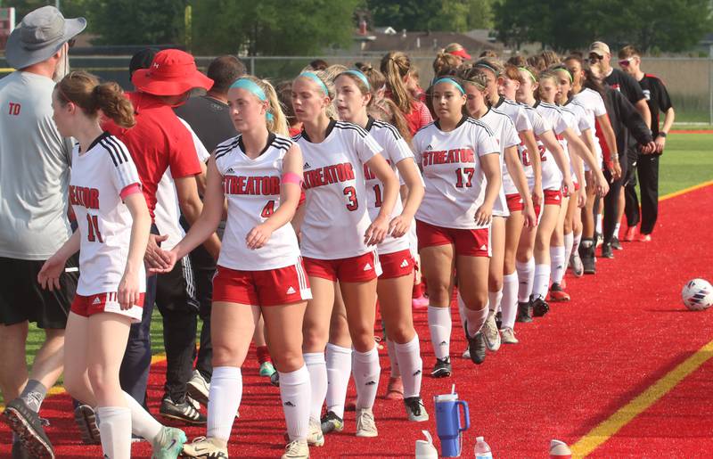 Members of the Streator girls soccer team shake hands with Morton after loosing 9-0 in the Class 2A Regional semifinal game on Wednesday, May 15, 2024 at the L-P Athletic Complex in La Salle.