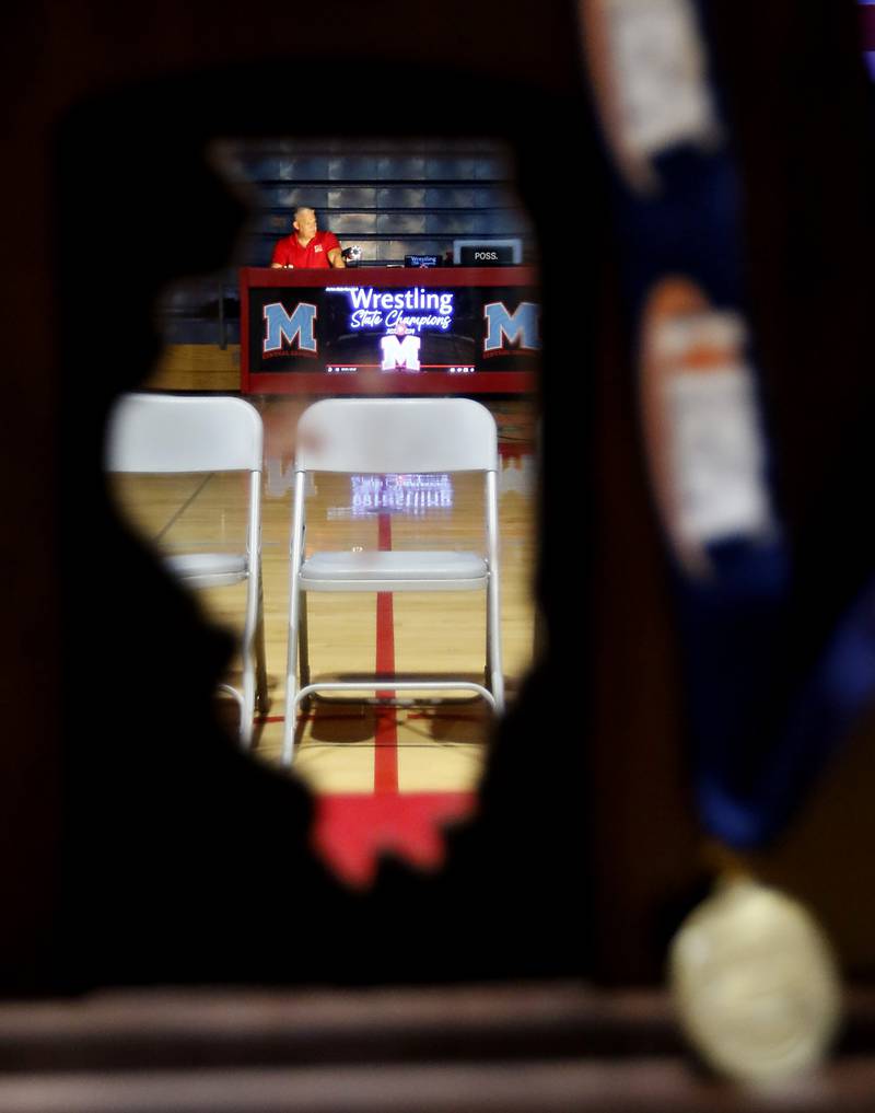 Pat Miller the voice of the Hurricanes announces the team as Marina Central honors their wrestlers that brought home the IHSA Class 1A Dual Team State Championship title on Friday, March 8, 2024, during a celebration at the high school in Woodstock.