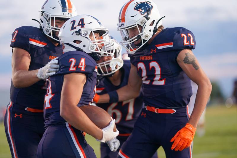 Oswego’s Ayden Villa (24) celebrates his second touchdown of the game against Joliet Catholic during a football game at Oswego High School on Friday, Sep 6, 2024.