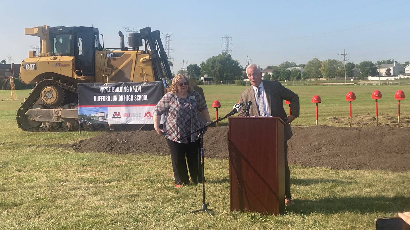 District 86 Superintendent Dr. Theresa Rouse and Joliet Mayor Terry D'Arcy speak at the groundbreaking for Hufford Junior High.