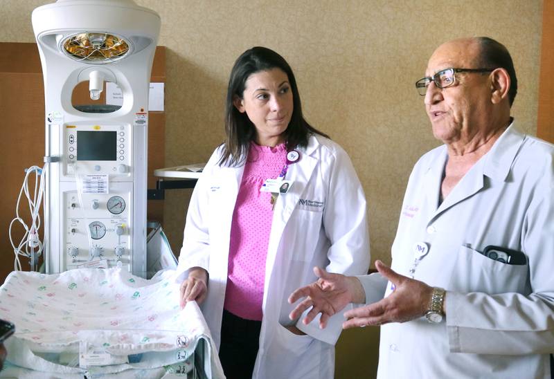 Ismail M. Abbasi MD, a neonatologists at Northwestern Medicine Kishwaukee Hospital, along with Colleen Faivre MSN, RN, patient care manager in Labor and Delivery at the hospital, talk Thursday, May 4, 2023, in one of the labor and delivery rooms at the facility, about the advantages of having an onsite neonatologist available in the department.