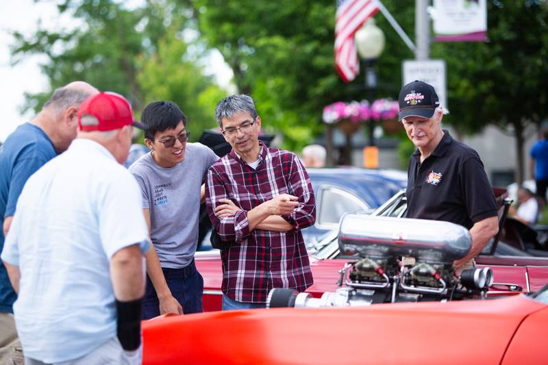 (L to R) Nathan L., George L., and Ron W., discuss the turbo charger on a Pontiac GTO during Cruisin’ Night in downtown Westmont on Thursday, June 6, 2024.

Suzanne Tennant/ For Shaw Local News Media