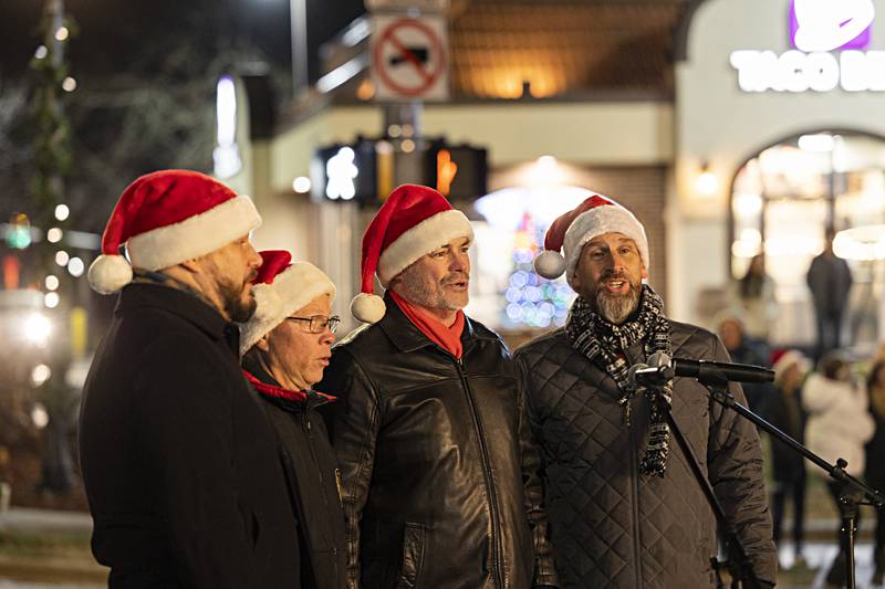 Singing group Spontaneous Combustion sets the mood Friday, Dec. 1, 2023 during Sterling’s Seasonal Sights and Sounds Christmas walk. The group did a little entertaining before the tree lighting.