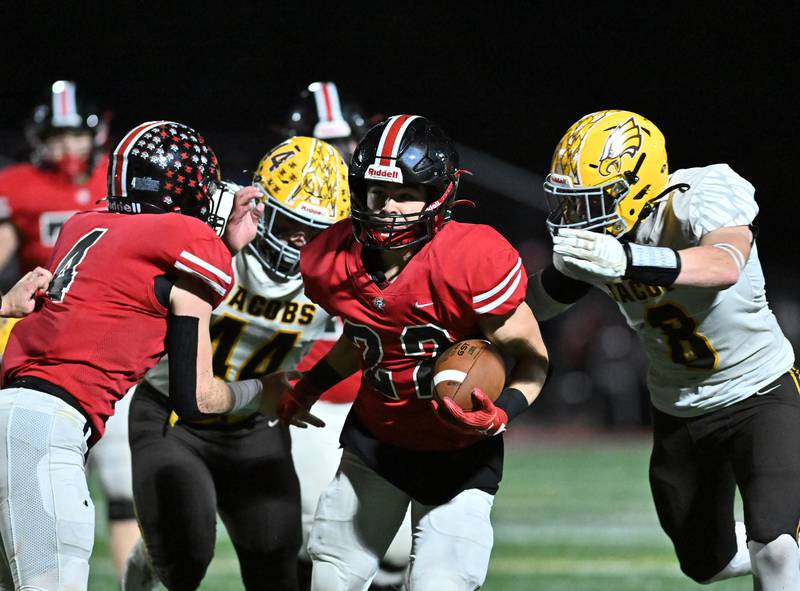 Lincoln-Way Central's Anthony Noto runs the ball during the class 7A first round  playoff game against Jacob on Friday, Oct. 27, 2023, at New Lenox. (Dean Reid for Shaw Local News Network)