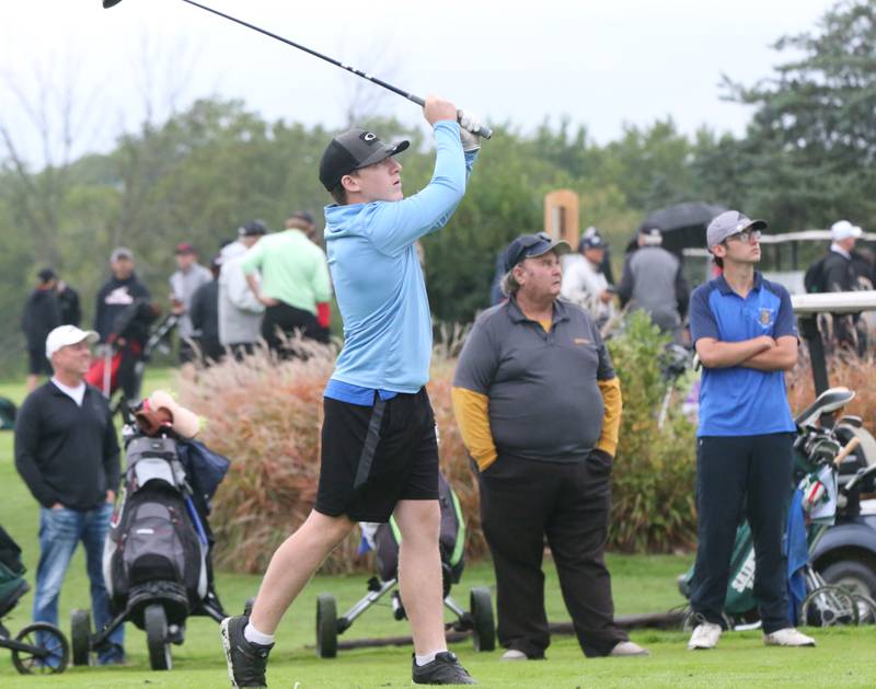 Marquette's Braxton Nelle tees off during the Class 1A Regional on Wednesday, Sept. 27, 2023 at Wolf Creek Golf Club in Pontiac.