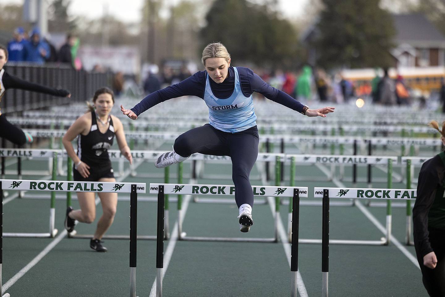 Bureau Valley’s Addison Wessels clears the final hurdle in her race Friday, April 21, 2023 at the Rock Falls Rocket Invitational.