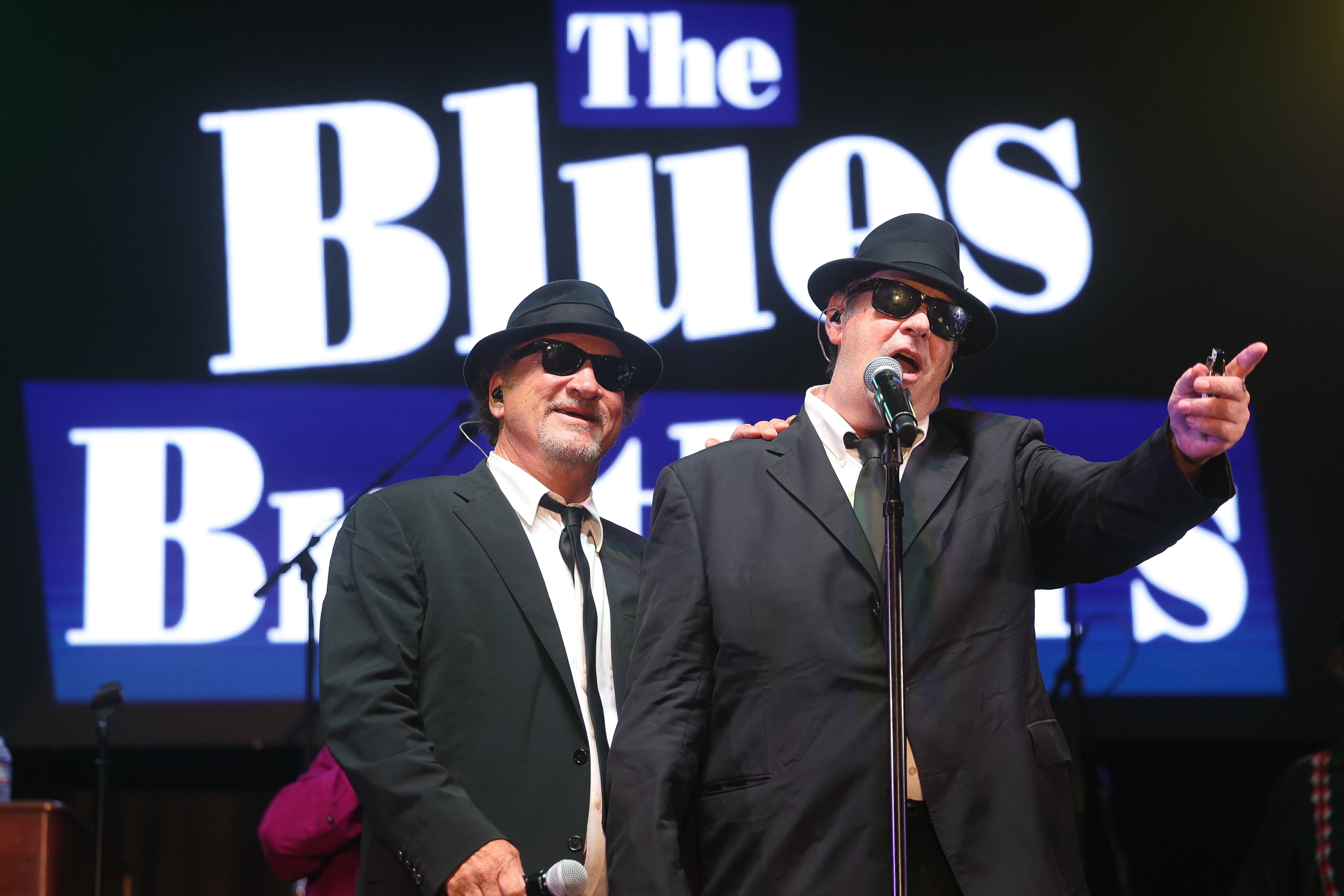 Jim Belushi. aka Zee Blues, and Dan Aykroyd, aka Elwood Blues, performs at Blues Brothers Con: The Sequel on Saturday, Aug. 17, 2024 at the Old Joliet Prison.