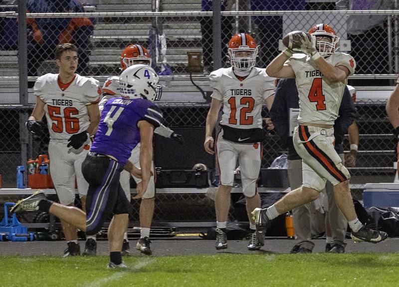 Byron’s Dawson Criddle hauls in a long pass to set the Tigers up for a TD with less than a minute left Friday, Oct. 18, 2024, at A.C. Bowers Field in Dixon.