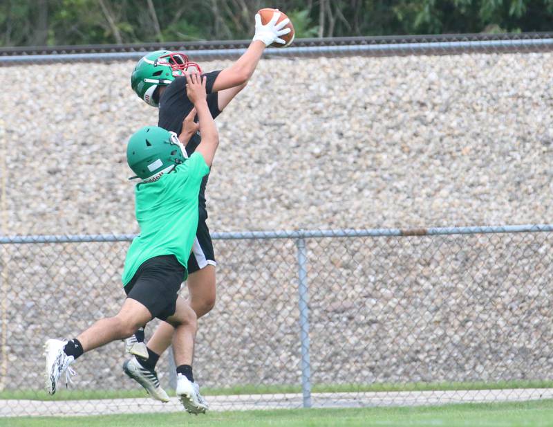 L-P's Mikey Hartman makes a catch against Seneca during a 7-on-7 meet on Wednesday, July 10, 2024 at Seneca High School.