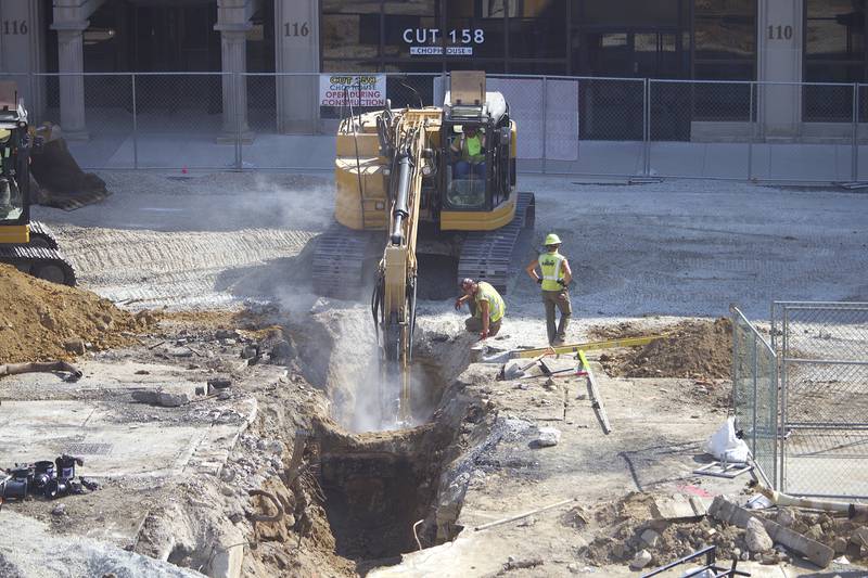 A construction crew tearing up the ground on Monday Sept. 16, 2024, next to Chicago Street in Joliet.