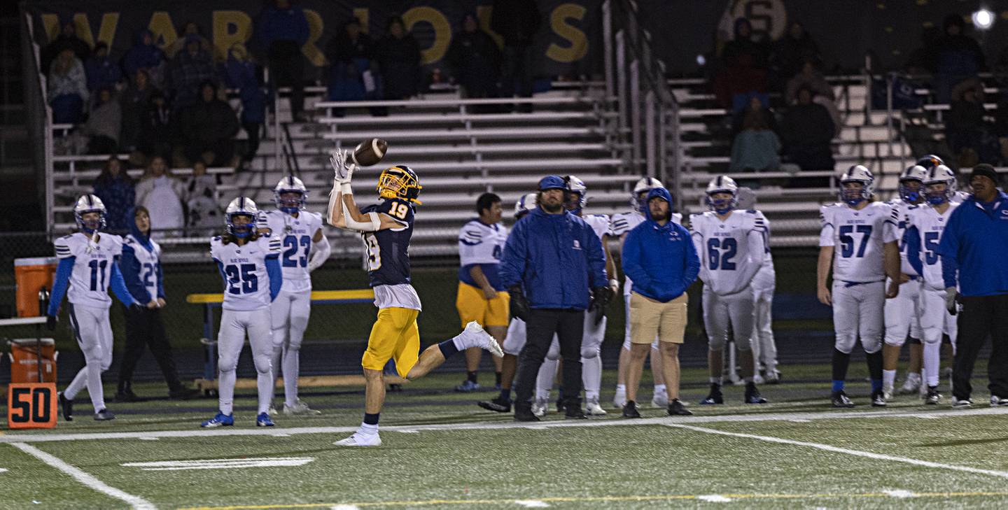 Sterling’s Mason Emin is wide open for a pass reception and touchdown against Quincy Friday, Oct.6, 2023 in Sterling.