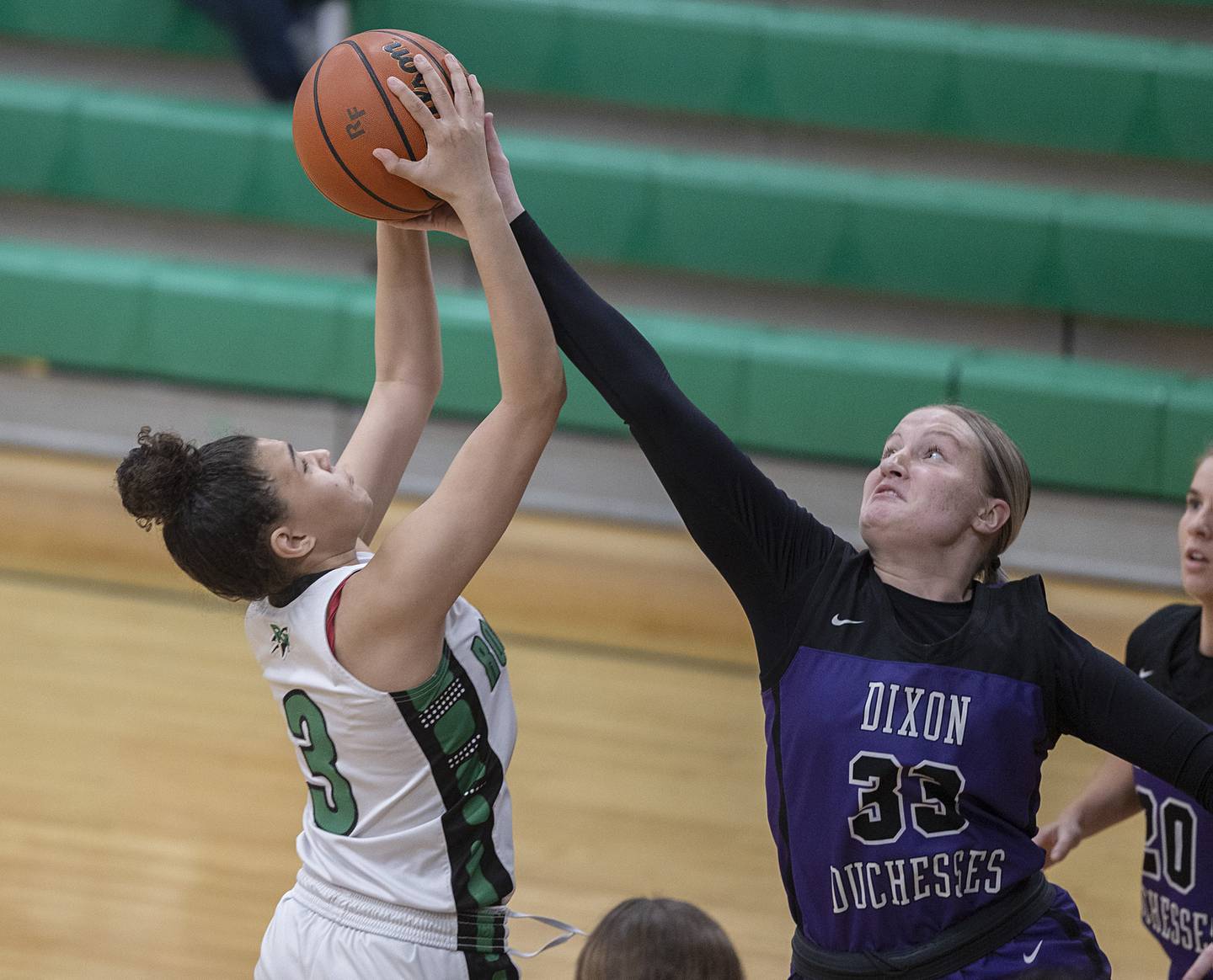 Rock Falls’ Autumn Weatherby and Dixon’s Jessie Pitman go up for a rebound Wednesday, Jan. 31, 2024 at Rock Falls High School.