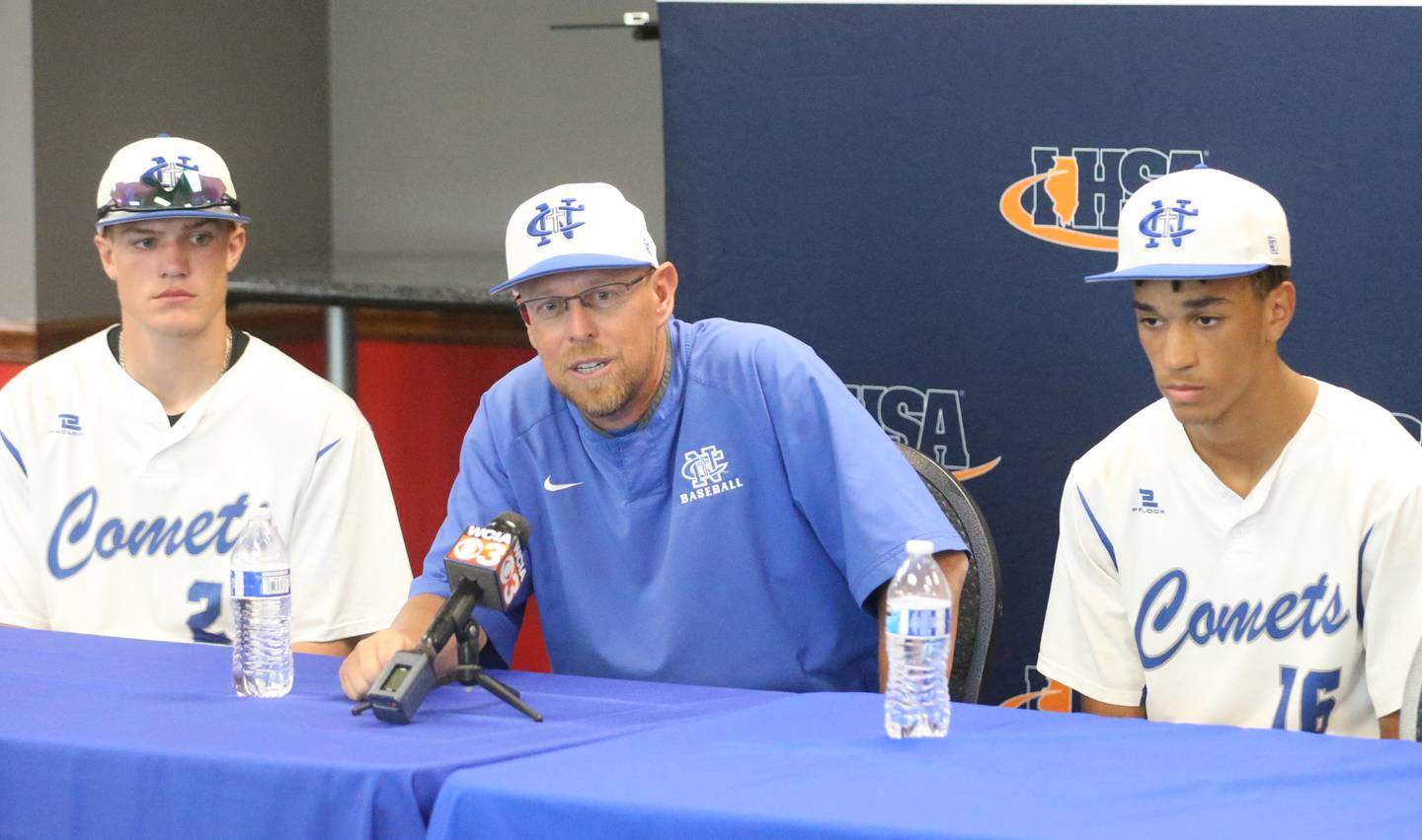 Newman head baseball coach Kenny Koerner speaks to the media with players Brendan Tunink and Isaiah Williams after the Class 2A semifinal game on Friday, May 31, 2024 at Dozer Park in Peoria.