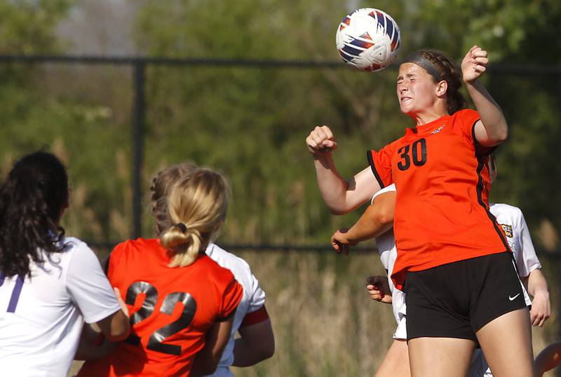 Crystal Lake Central's Shaylee Gough heads the ball towards the goal during the IHSA Class 2A Grayslake North Regional championship soccer match against Wauconda on Friday, May 17, 2024, at Grayslake North High School.