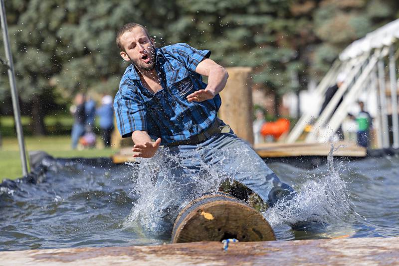 Tyler Berard loses his balance during the boom run at the Lumberjack show Saturday, Oct. 7, 2023.