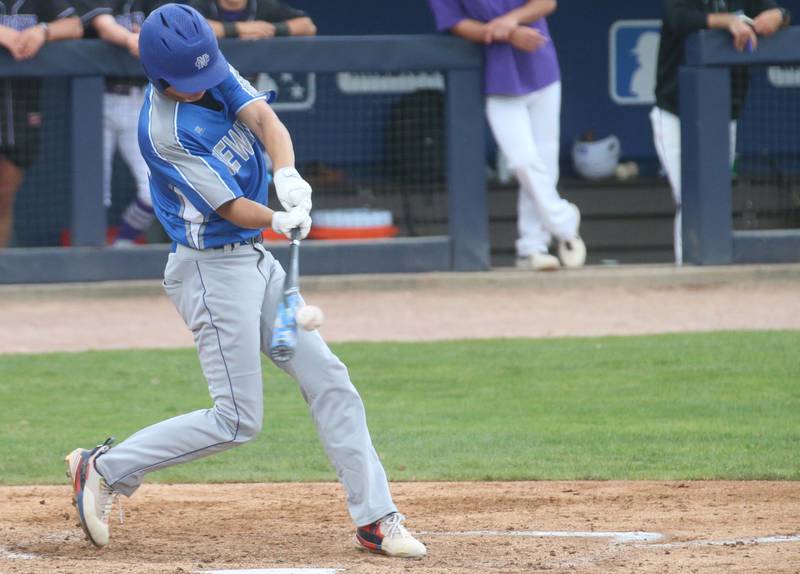 Newman's Chase Decker makes contact with the ball against Wilmington during the Class 2A third place game on Saturday, June 1, 2024 at Dozer Park in Peoria.