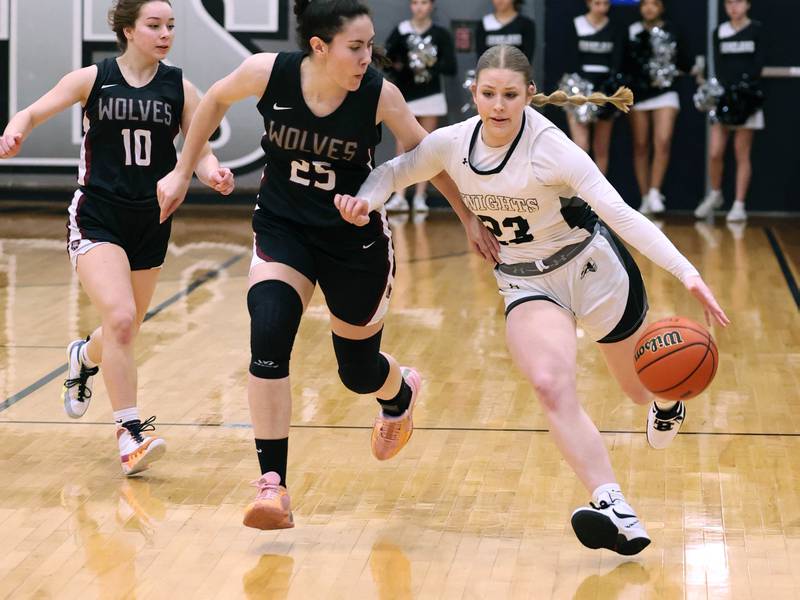 Kaneland's Kendra Brown pushes the ball up court against Prairie Ridge's Addie Meyer Thursday, Feb 15, 2024, during their Class 3A regional final game at Kaneland High School in Maple Park.