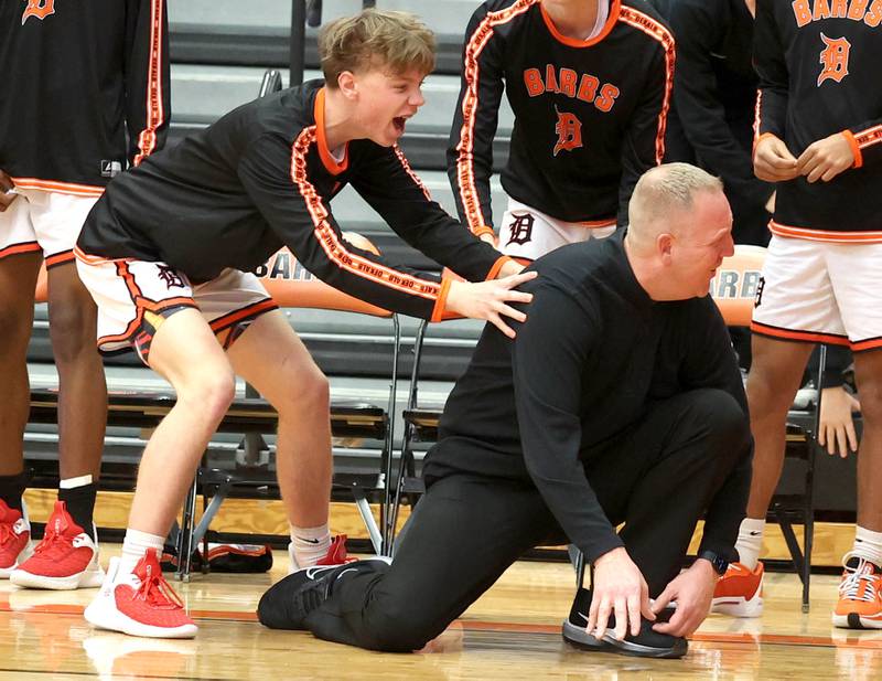 DeKalb head coach Mike Reynolds reacts as DeKalb’s Eric Rosenow’s shot rims out at the buzzer causing overtime during their game against Metea Valley Friday, Jan. 19, 2024, at DeKalb High School.