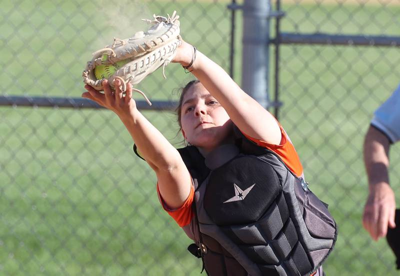 DeKalb's Madison Hallaron catches a foul popup during their Class 4A regional semifinal game against Rockford Auburn Wednesday, May 22, 2024, at Hampshire High School.