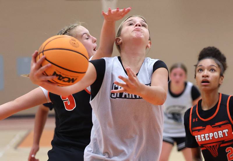 Sycamore’s Quinn Carrier goes to the basket during their summer game against Freeport Monday, June 17, 2024, at DeKalb High School.