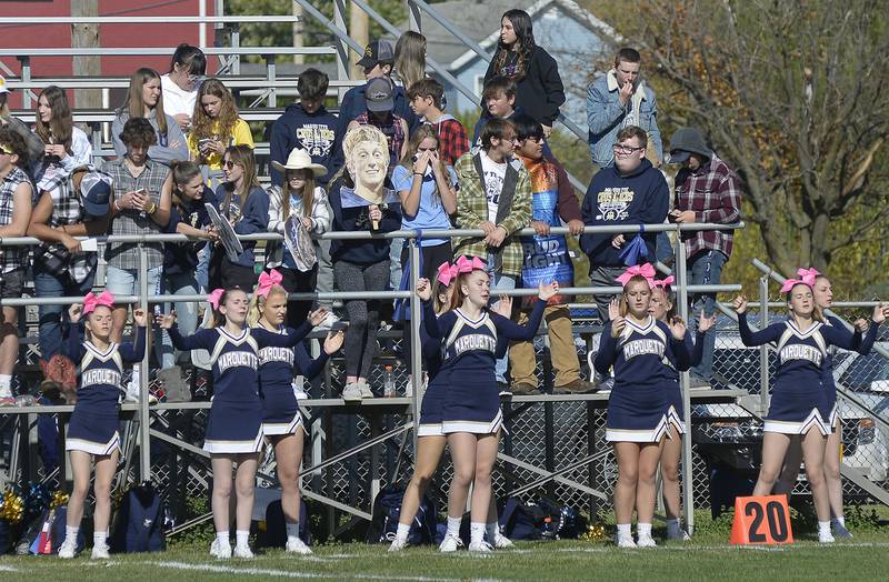 Marquette Cheerleaders work to cheer up fans after a Morrison touchdown during Saturday’s regional game at Marquette.during the Class 1A first round playoff game on Saturday, Oct. 29, 2022 at Gould Stadium in Ottawa.