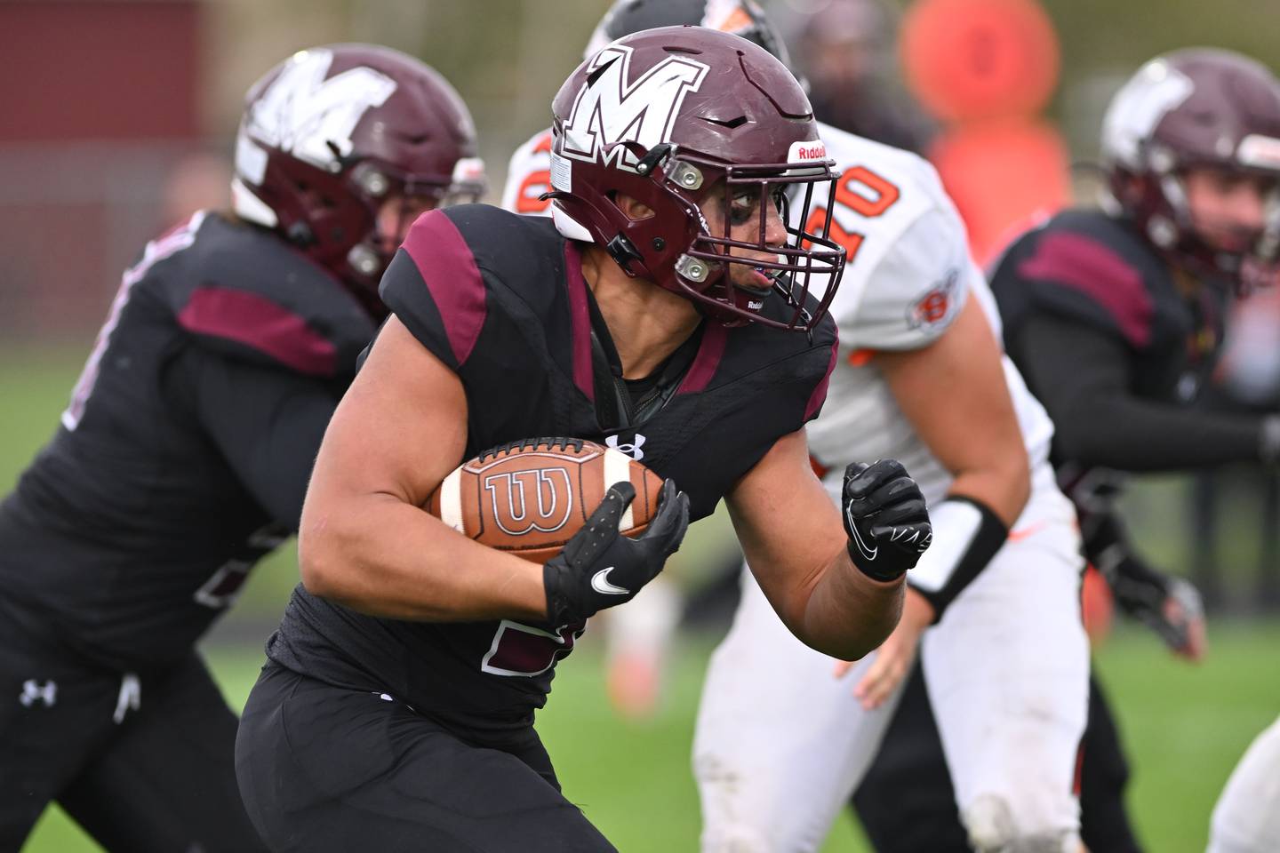 Marengo's Isaac Anthony runs for yardage against Kishwaukee River Conference rival Sandwich on Saturday, Oct. 14, 2023 in Marengo.
