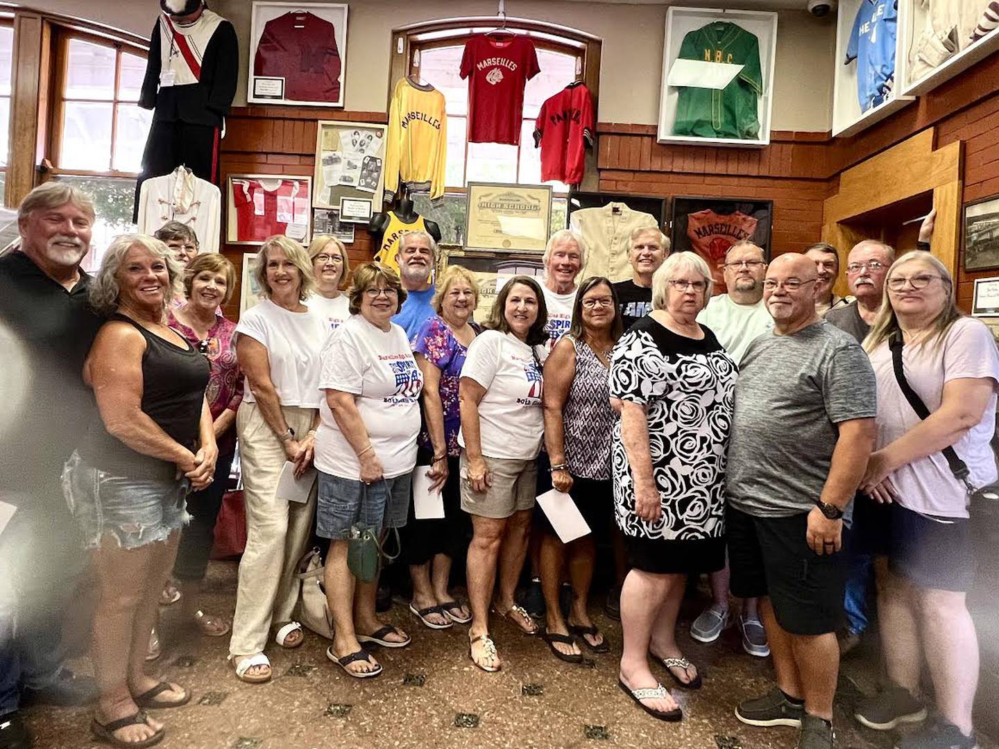 The Marseilles High School Class of 1976 spent time at Seattle Sutton Marseilles Museum, along with their spouse/friend (back, from left to right) Tammy (Taylor) Fleming, Jane Grove, Kathy (Foster) Caputo, Don Sarles, Al Linton, Tim
Hovious, Paul Ringer, Steve Farrell, Greg Plique; (front left to right) Craig Emmett, Kim Emmett, Laura (CliRord) Fritz, Donna (Fisher) Wise, Janet (Maskel) Meyer, Kathleen Funk-Linton, Cheryl (Fenoglio) Ringer, Shelia (Byrd) Terry, Dan Terry and Gail (Galloway) Plique.