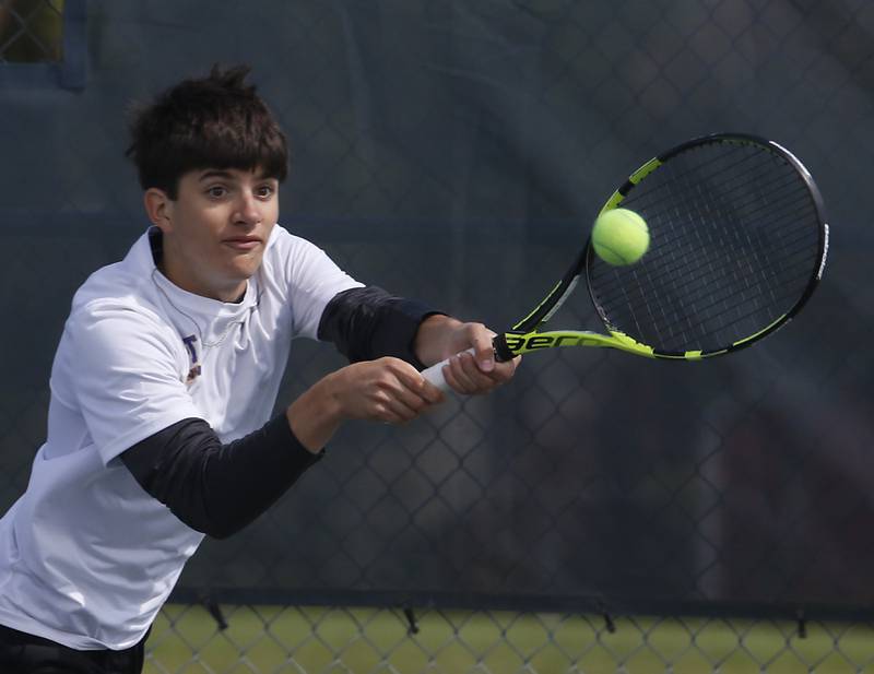 Lyons' Mason Mazzone returns the ball during an IHSA 2A boys doubles tennis match Thursday, May 25, 2023, at Buffalo Grove High School.