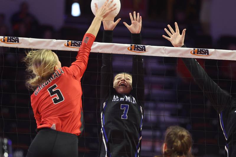Newman’s Makenzie Duhon blocks a shot against Norris City-Omaha-Enfield in the Class 1A 3rd place match on Saturday in Normal.