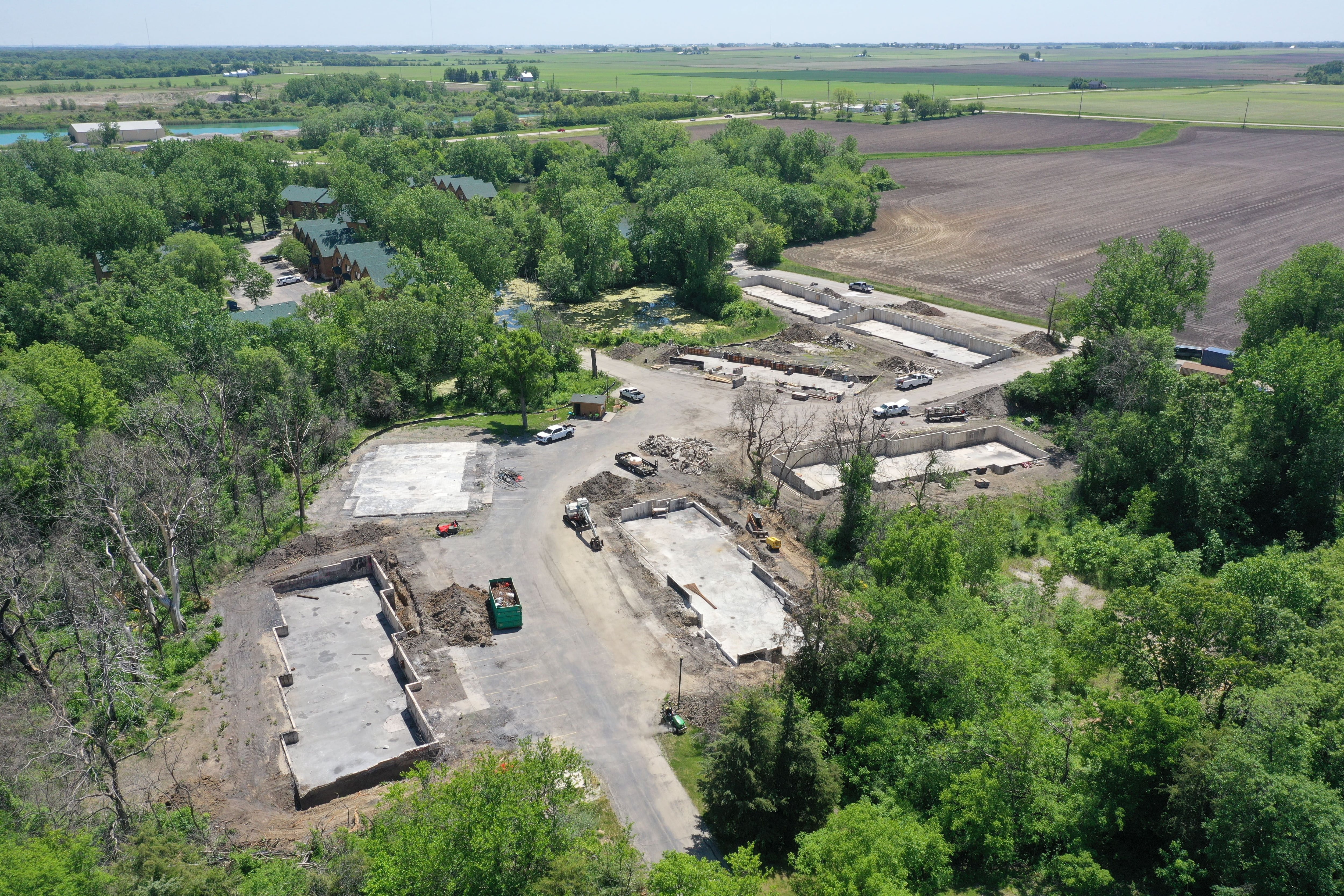 An aerial view of the site where a major fire broke out one year earlier Grand Bear Resort at Starved Rock. Foundations have been poured and crews are beginning to rebuild after the fire.