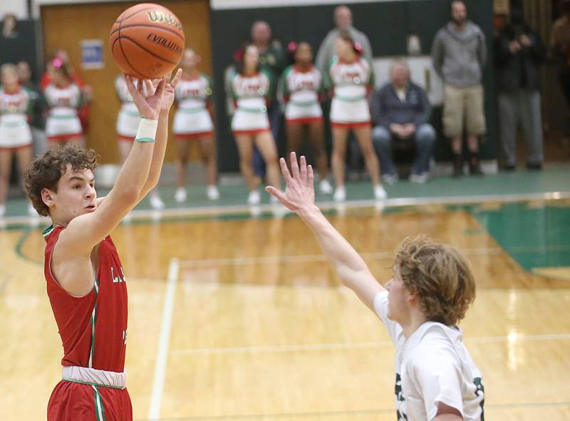 L-P's Jack Jareb shoots a jump shot over St. Bede's Kaden Newman on Wednesday, Feb. 14, 2024 at St. Bede Academy.