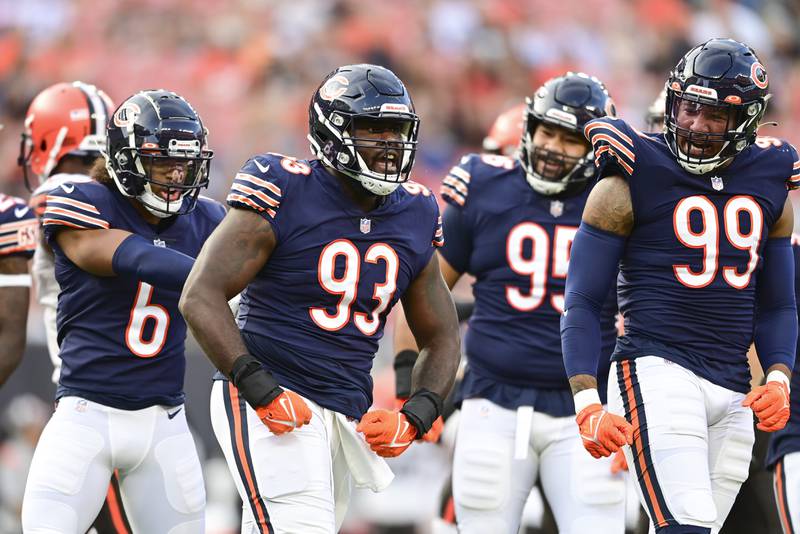 Chicago Bears defensive tackle Justin Jones (93) celebrates after making a tackle against the Cleveland Browns during a preseason game, Saturday, Aug. 27, 2022, in Cleveland.