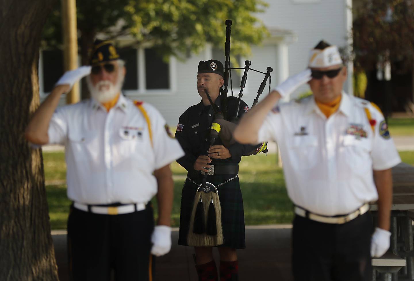 Algonquin firefighter Frank Pelanek plays the bagpipes during a 9/11 remembrance ceremony on Sept. 11, 2024, at Veteran's Memorial Park in McHenry.