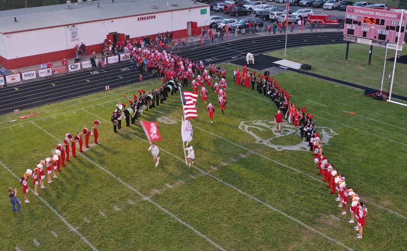 The Streator Bulldogs take the field at Doug Dieken Stadium during the 103rd meeting between Ottawa and Streator football. The first played on Nov. 3, 1894.