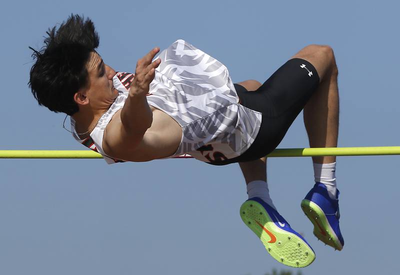 McHenry’s Hayden Stone competes in the high jump during the Huntley IHSA Class 3A Boys Sectional Track and Field Meet on Wednesday, May 15, 2024, at Huntley High School.