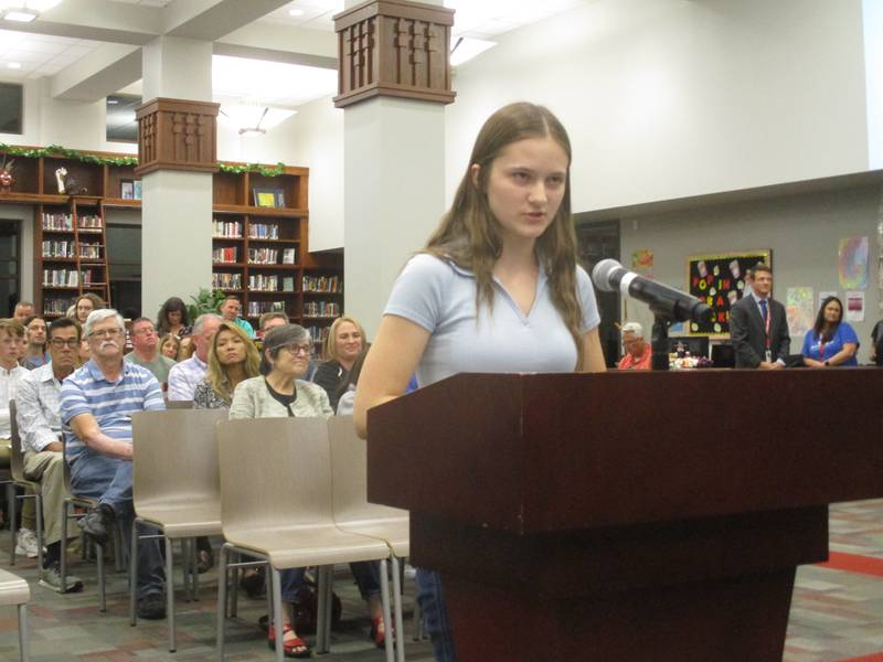 Yorkville High School senior Alexis Barkman speaks before the Yorkville School Board on Sept. 28, 2023 in the school library. Barkman and other YHS students criticized the board for its decision to prohibit a book from being taught in an English class.
