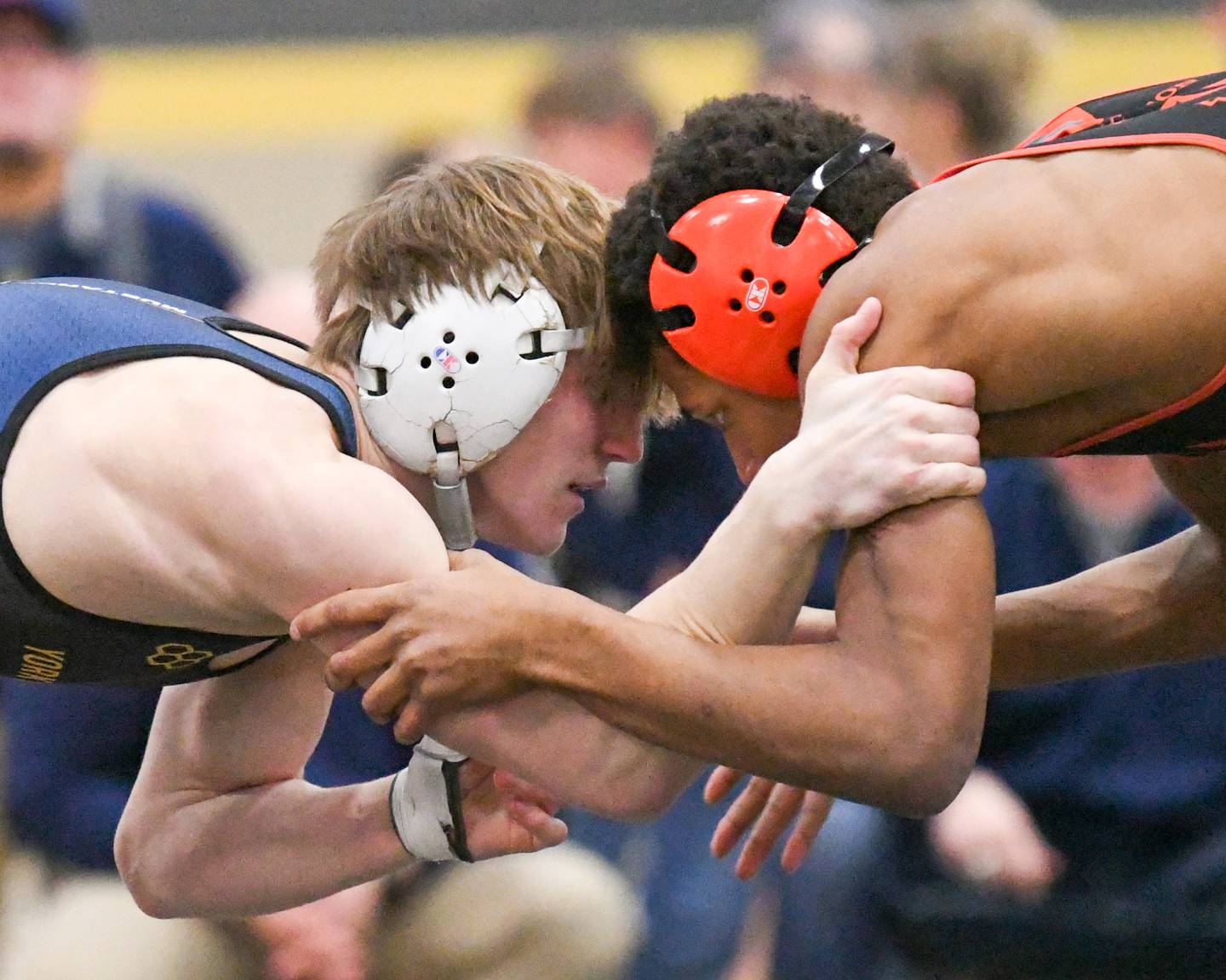 Yorkville Christian Ty Edwards, left, goes head to head with Washington wrestler Timmy Smith in the 132 weight class during the 2A sectional meet on Saturday Feb. 10, 2024, held at Sycamore High School.