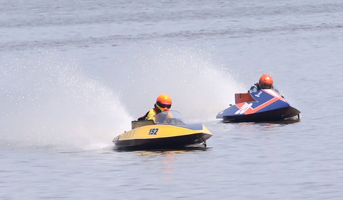 Brady Brinkman of Springfield and Ethan Fox of Elkhorn Neb. races in the 125cc Runabout during the US Title Series Pro National Championship Boat Races on Friday, July 26, 2024 at Lake DePue.