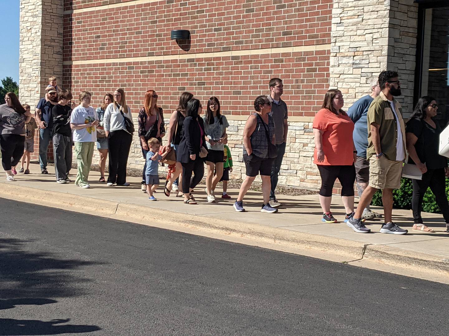 People lined up for the Barnes & Noble’s new store in Oswego to open its doors June 12.