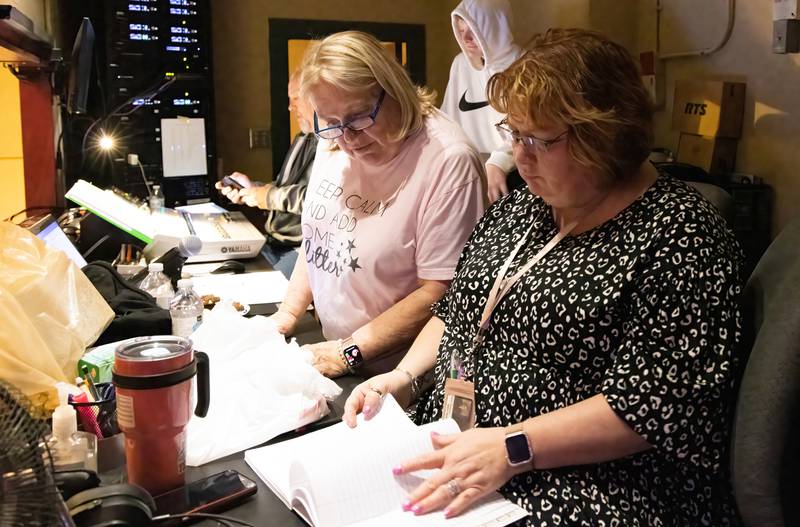 Ottawa High School director Sue Williamson and assistant director Sally Taliani take notes during dress rehearsal Tuesday, April 25, 2023.