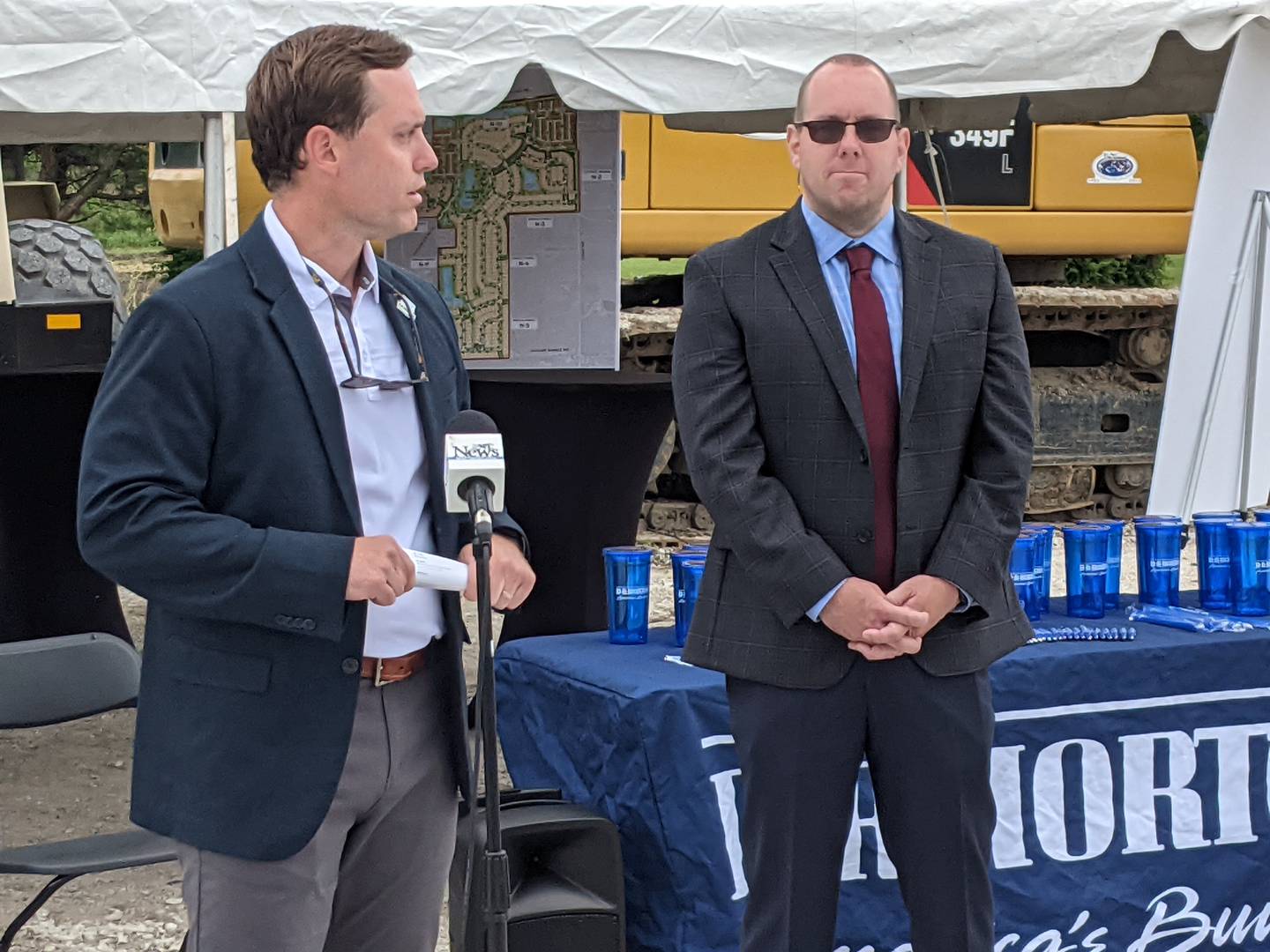 Cole Tyrell, left, division president at D.R. Horton, speaks prior to the May 29 groundbreaking ceremony for Sonoma Trails subdivision. To his right is Oswego Village President Ryan Kauffman.