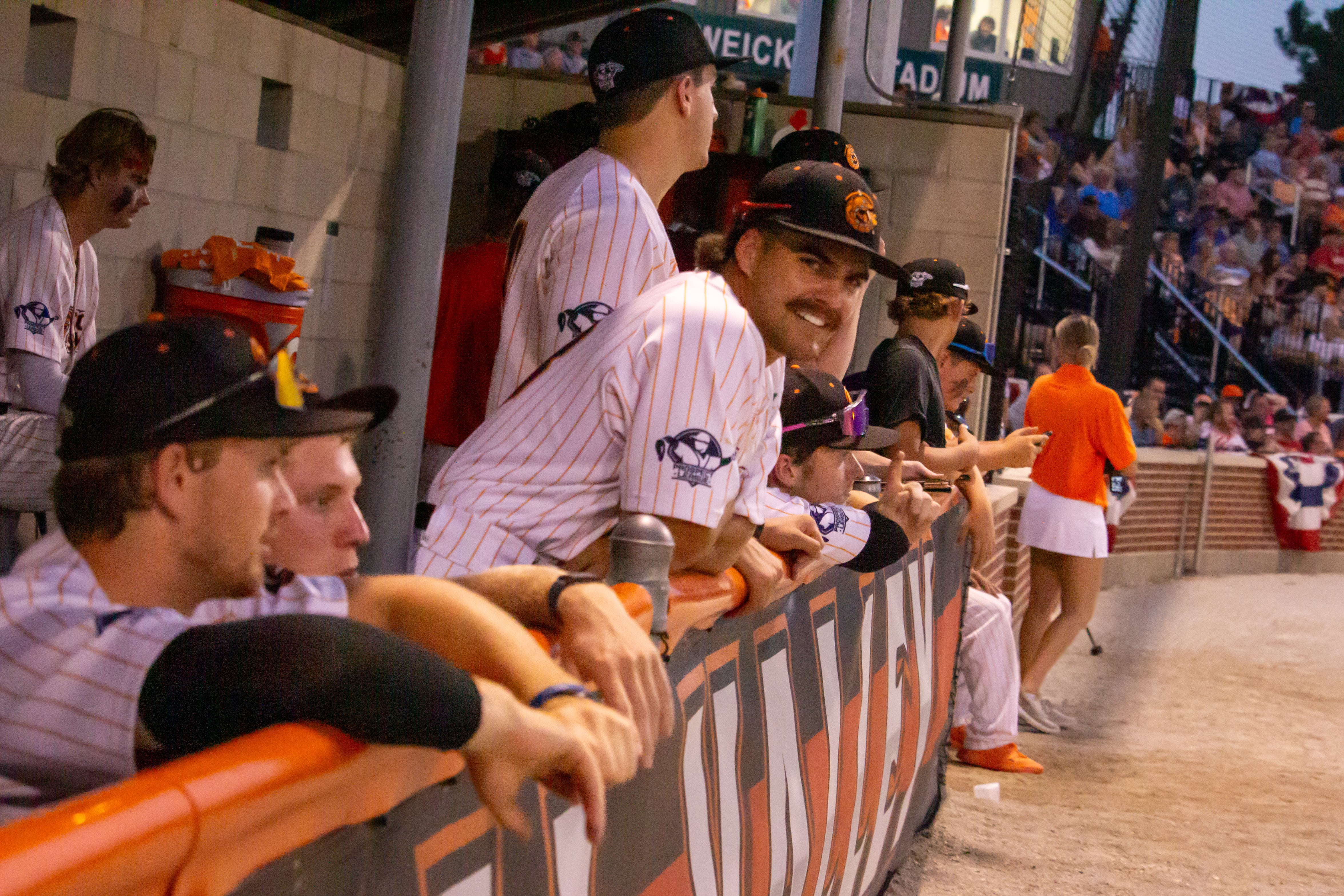 Illinois Valley Pistol Shrimp players watch the game Thursday, Aug. 1, 2024, from their dugout at Veterans Park in Peru.