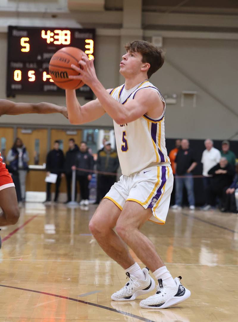 Downers Grove North’s Owen Thulin (5) takes a shot against Homewood-Flossmoor during the When Sides Collide Shootout on Saturday, Jan. 20, 2024 in Lisle, IL.