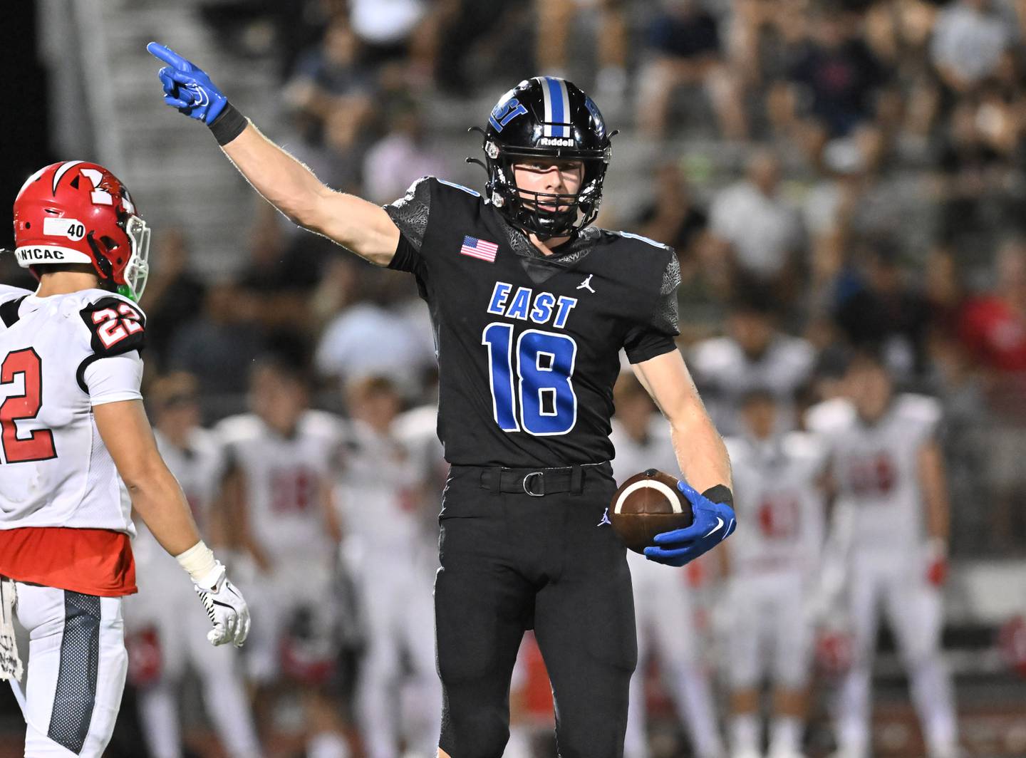 Lincoln-Way East's Sean Lefevour picks up the first down during a non-conference game against Maine South on Friday, Aug. 30, 2024, at Frankfort. (Dean Reid for Shaw Local News Network)