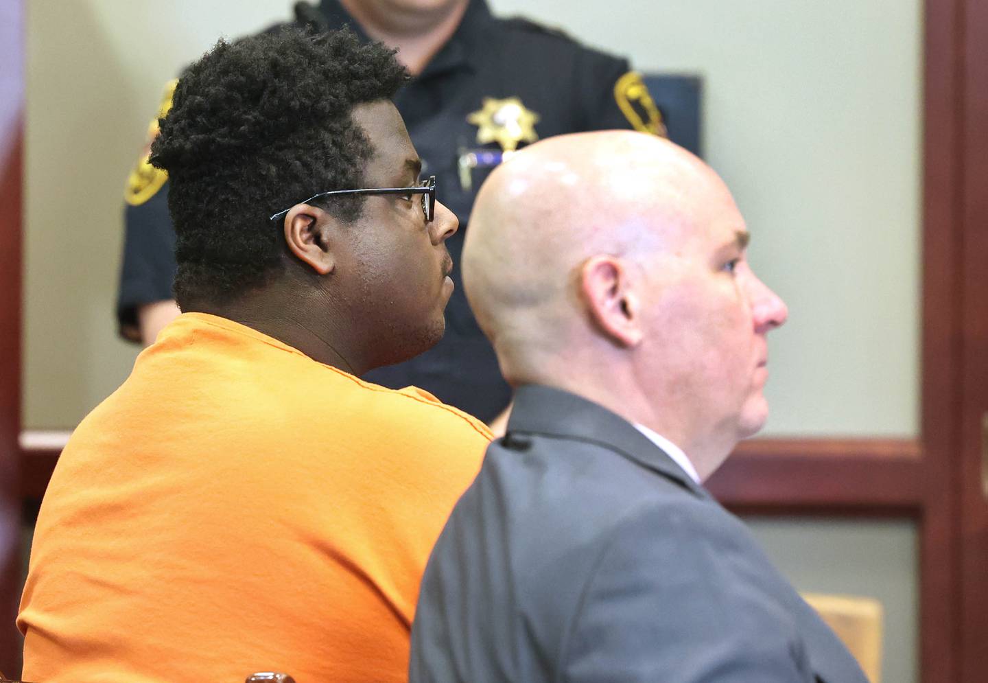 Timothy M. Doll, 29, of DeKalb, (left) and his attorney Andrew Nickel listen as Circuit Court Judge Philip Montgomery reads the charges against him Wednesday, June 14, 2023, at the DeKalb County Courthouse. Doll is being arraigned on several charges including two counts of first-degree murder in the death of 15-year-old Gracie Sasso-Cleveland of DeKalb.