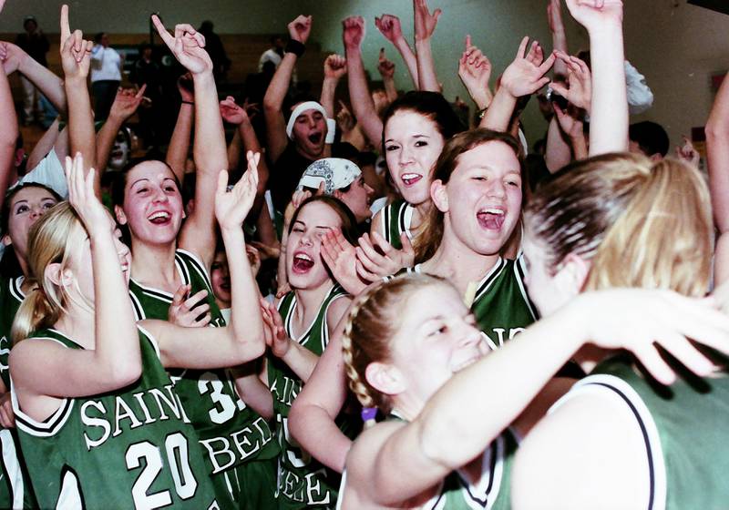 Members of the 2000 St. Bede Lady Bruins celebrate winning the Class 1A Sectional after defeating Rockridge on Feb. 14, 2000 at Bureau Valley High School.