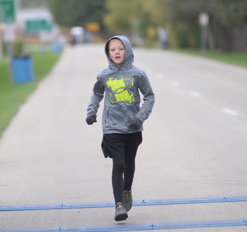 Lane Groenhagen of Oregon finished first in the 1-Mile Fun Run during Autumn on Parade on Sunday, Oct. 8 at Oregon Park West.