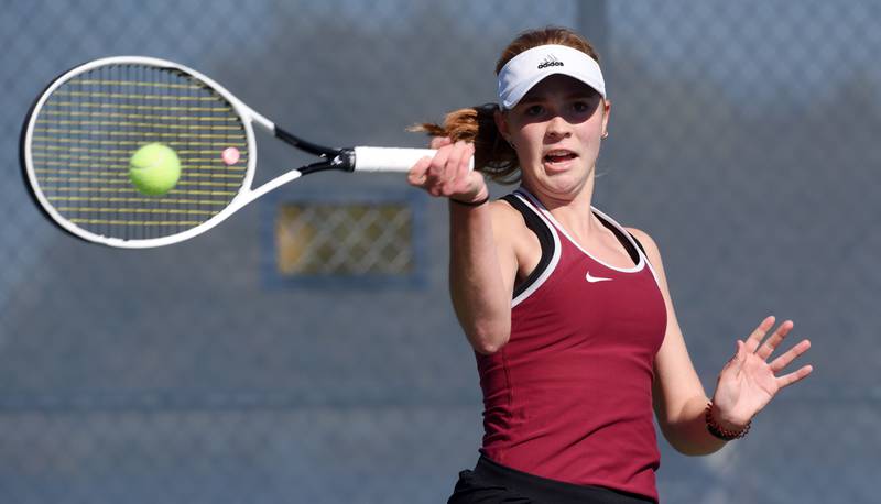 Plainfield North’s Jessica Kovalcik returns the ball in the Class 2A singles championship match during girls state tennis meet in Buffalo Grove Saturday.